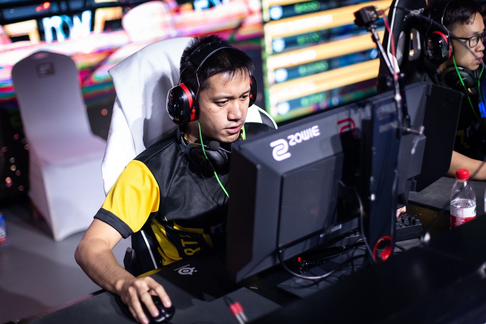 Player analyzing agent ability combinations during a tactical briefing